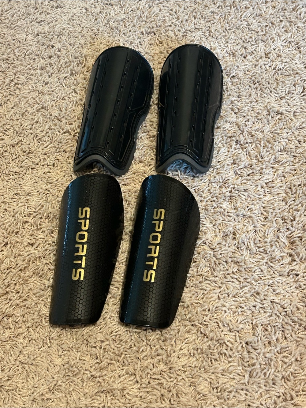 Black Soccer Shin Guards with 'SPORTS' Logo